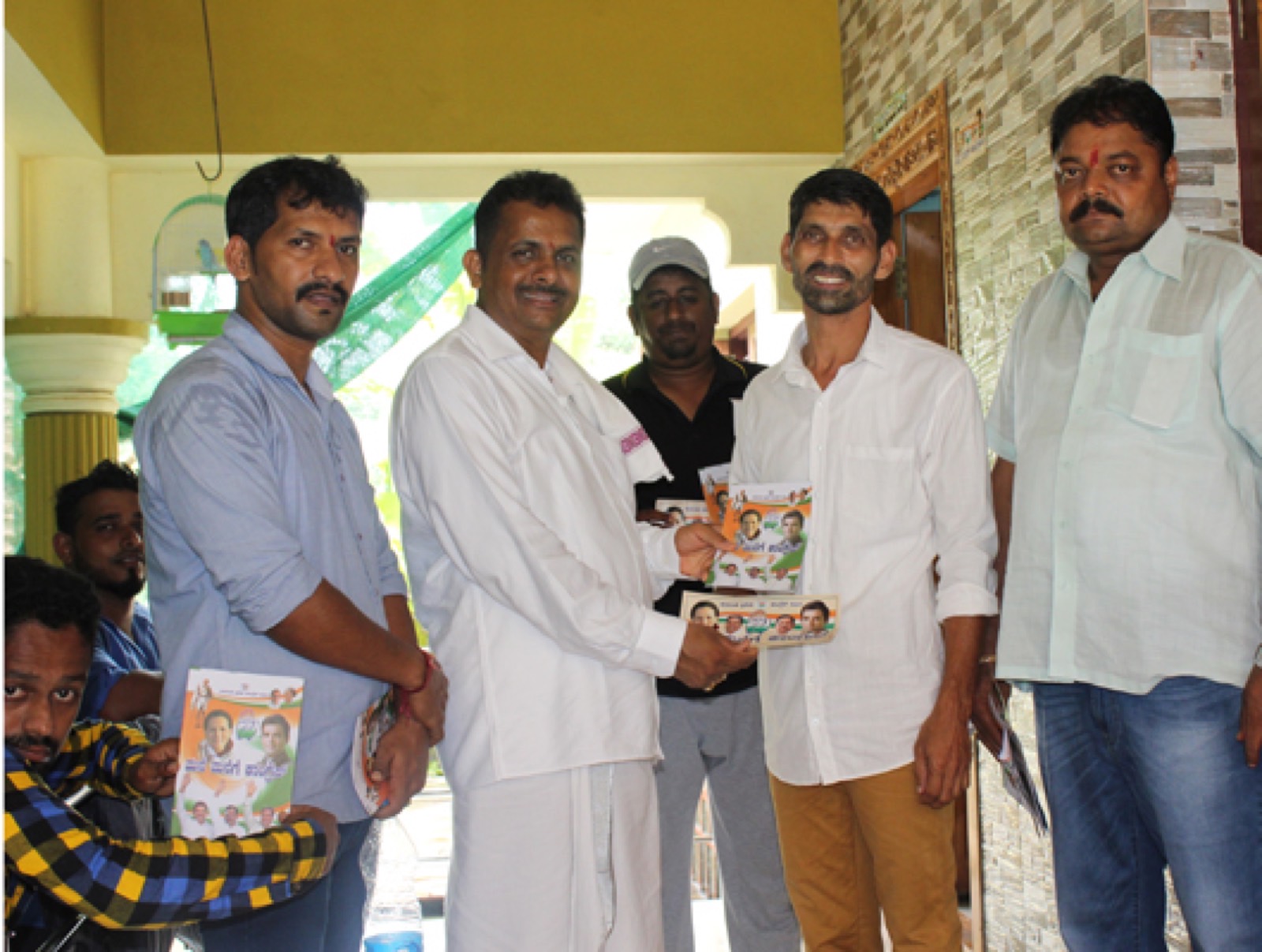 Udaya Shetty Muniyal meeting residents during the door-to-door campaign